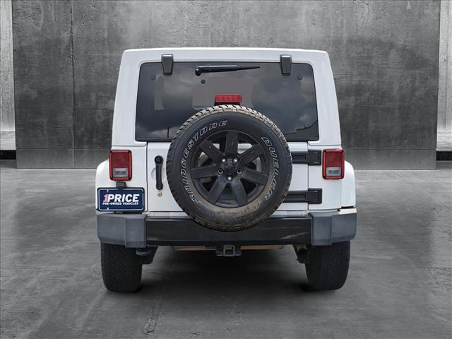 used 2014 Jeep Wrangler Unlimited car, priced at $15,588