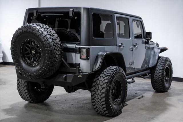 used 2015 Jeep Wrangler Unlimited car, priced at $24,777