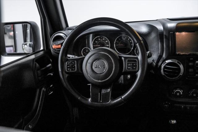 used 2015 Jeep Wrangler Unlimited car, priced at $24,777