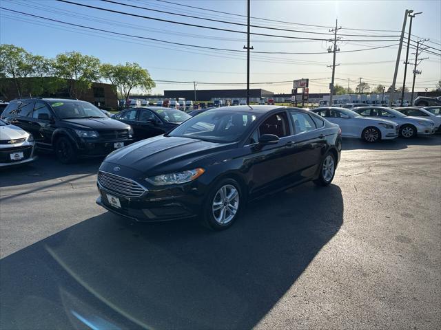 used 2018 Ford Fusion car, priced at $13,497