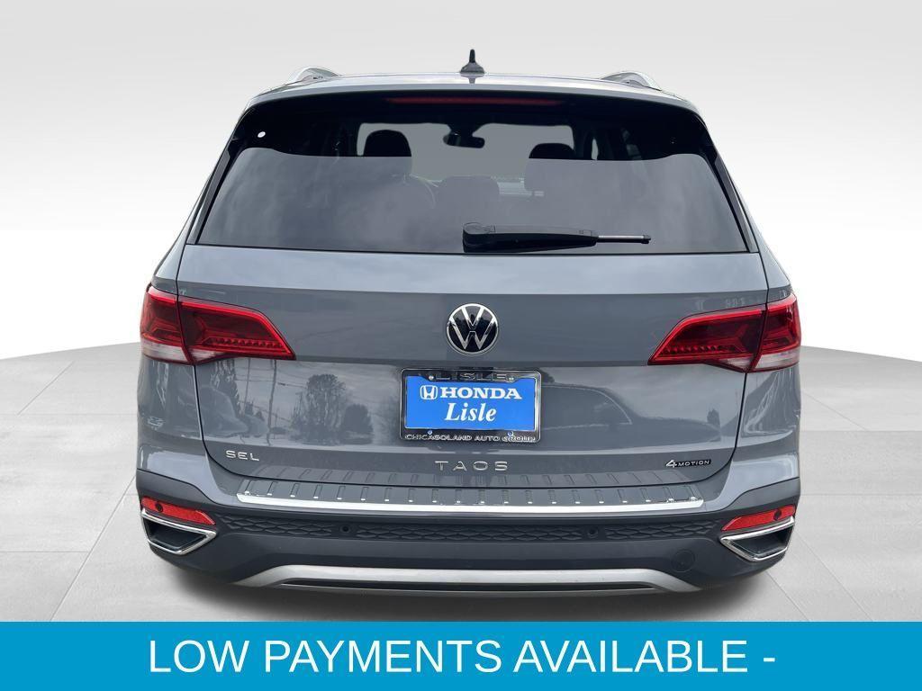 used 2022 Volkswagen Taos car, priced at $25,872