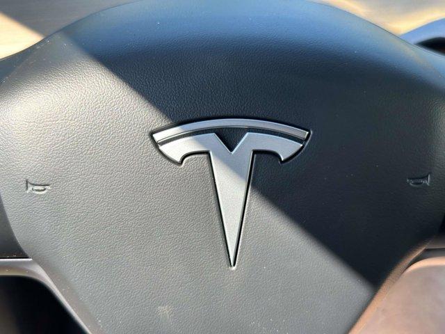 used 2024 Tesla Model Y car, priced at $29,890