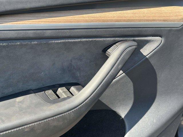 used 2024 Tesla Model Y car, priced at $29,890