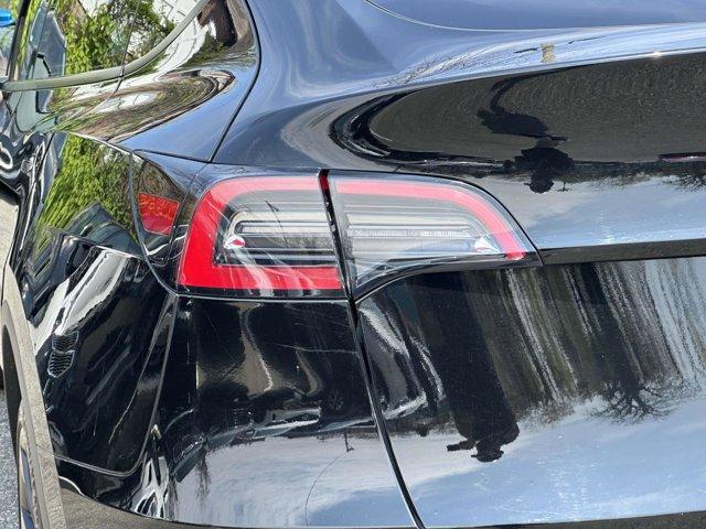used 2023 Tesla Model Y car, priced at $25,490