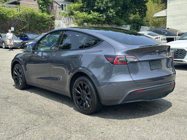 used 2023 Tesla Model Y car, priced at $24,890