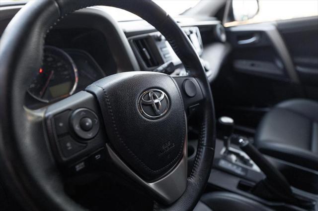 used 2015 Toyota RAV4 car, priced at $14,990