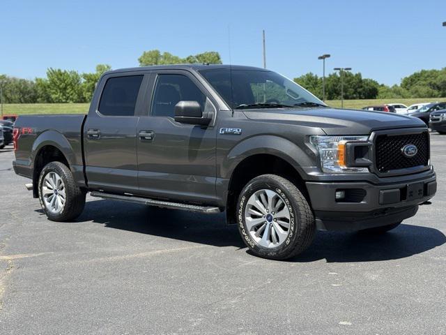 used 2018 Ford F-150 car, priced at $28,991