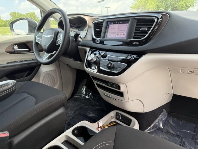 used 2023 Chrysler Voyager car, priced at $19,706