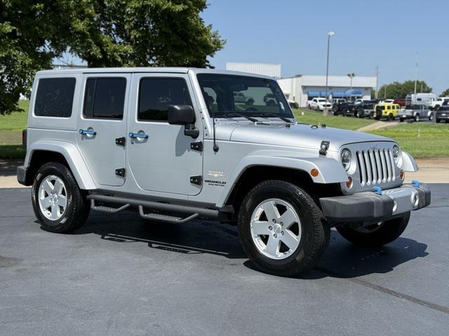 used 2012 Jeep Wrangler Unlimited car, priced at $16,991