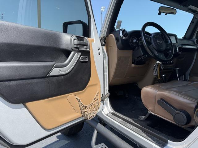 used 2012 Jeep Wrangler Unlimited car, priced at $16,991