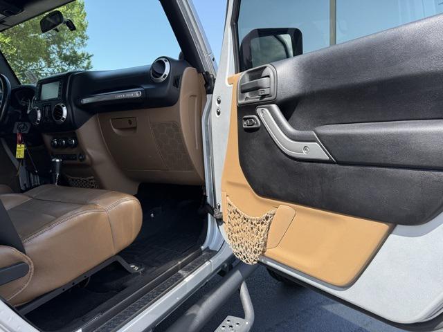 used 2012 Jeep Wrangler Unlimited car, priced at $16,991