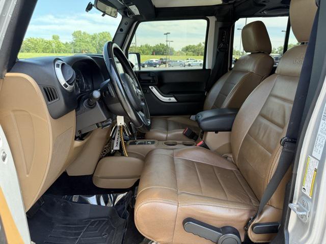 used 2012 Jeep Wrangler Unlimited car, priced at $16,991