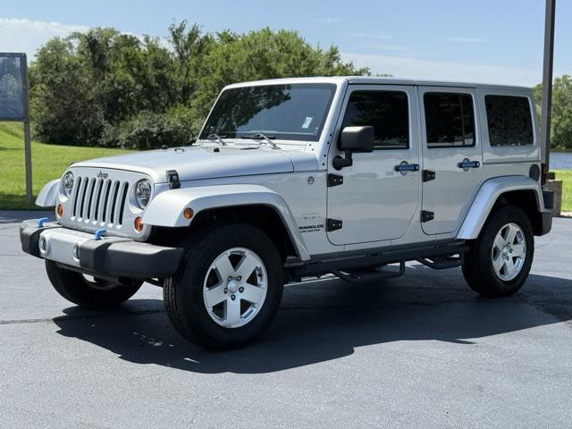 used 2012 Jeep Wrangler Unlimited car, priced at $16,991