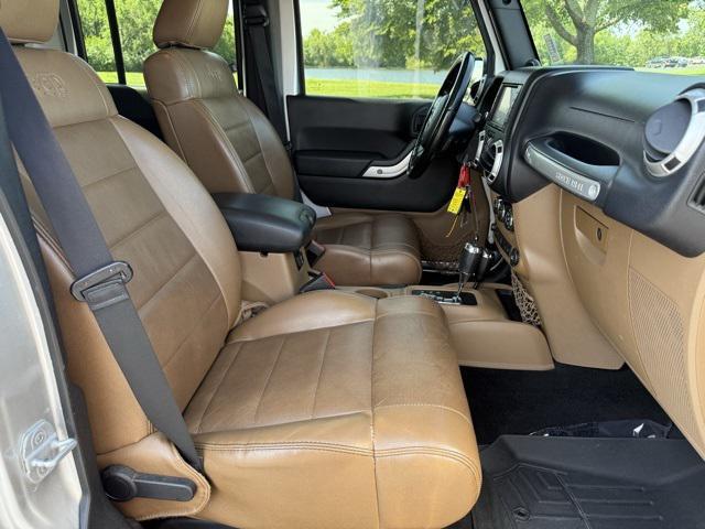 used 2012 Jeep Wrangler Unlimited car, priced at $16,991