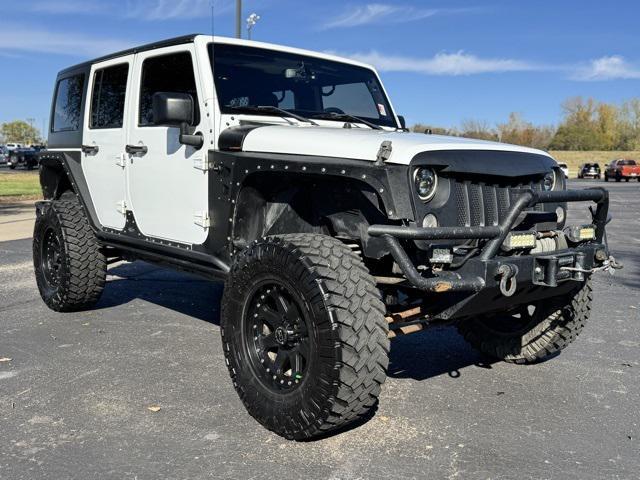 used 2015 Jeep Wrangler Unlimited car, priced at $21,093