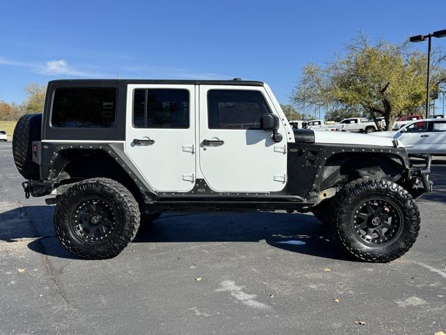 used 2015 Jeep Wrangler Unlimited car, priced at $21,093