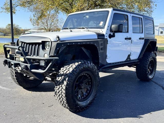 used 2015 Jeep Wrangler Unlimited car, priced at $21,093