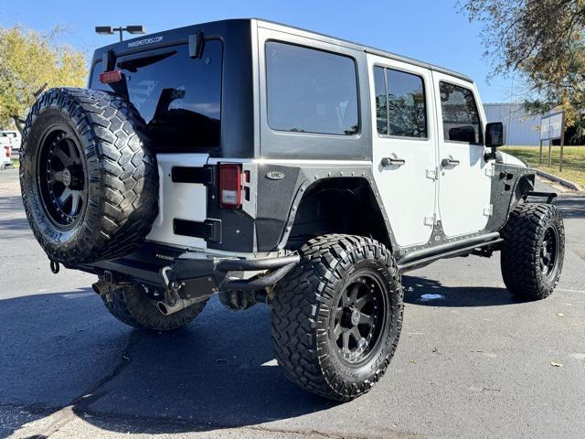 used 2015 Jeep Wrangler Unlimited car, priced at $21,093