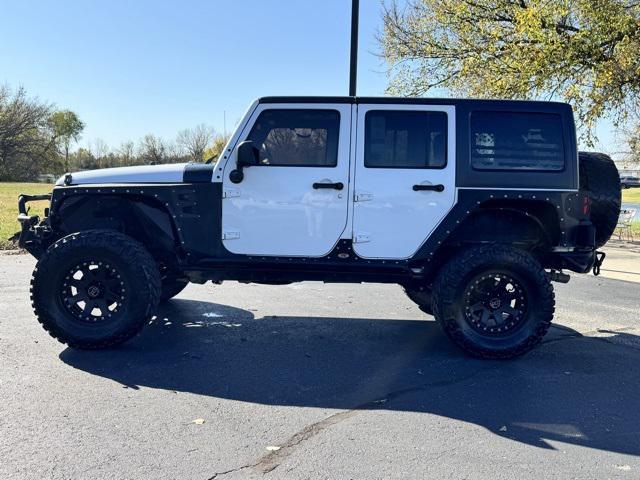 used 2015 Jeep Wrangler Unlimited car, priced at $21,093