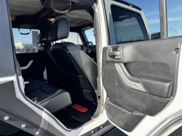 used 2015 Jeep Wrangler Unlimited car, priced at $21,093