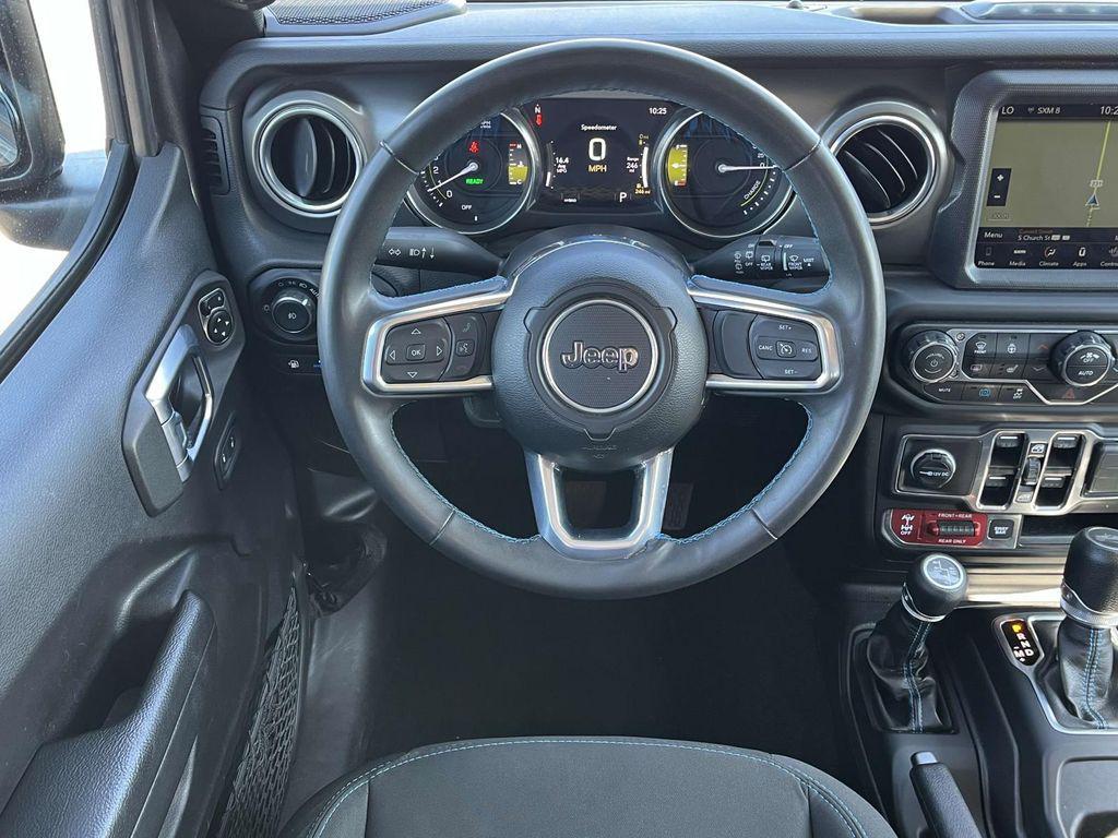 used 2023 Jeep Wrangler 4xe car, priced at $31,653