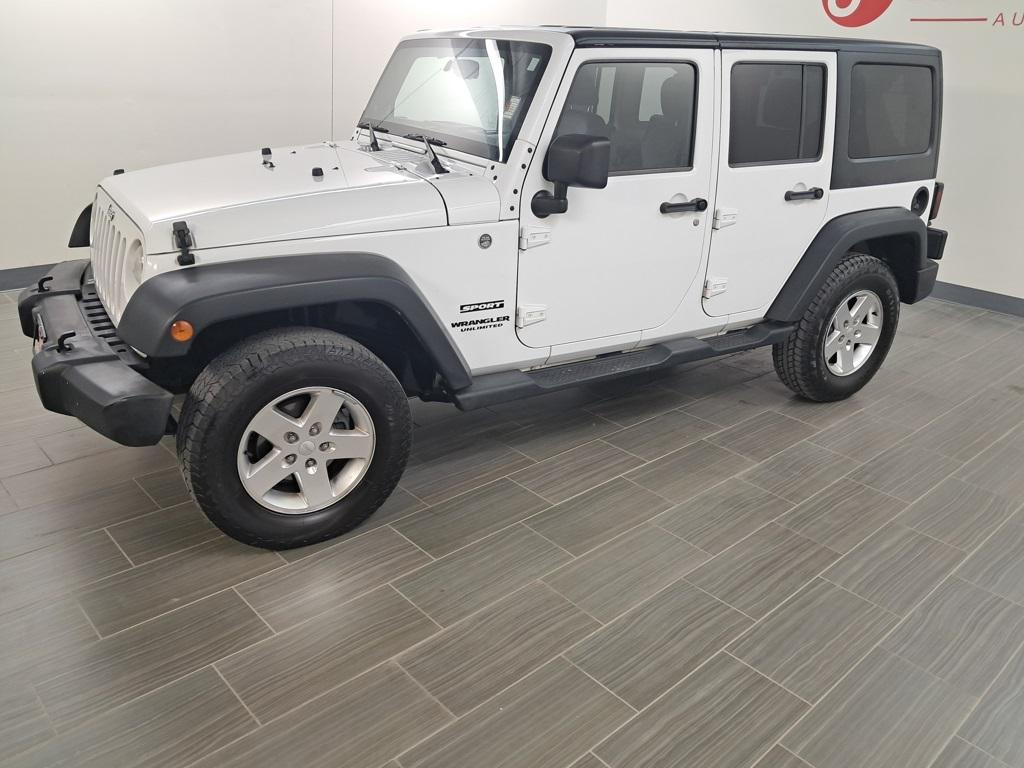 used 2013 Jeep Wrangler Unlimited car, priced at $13,499