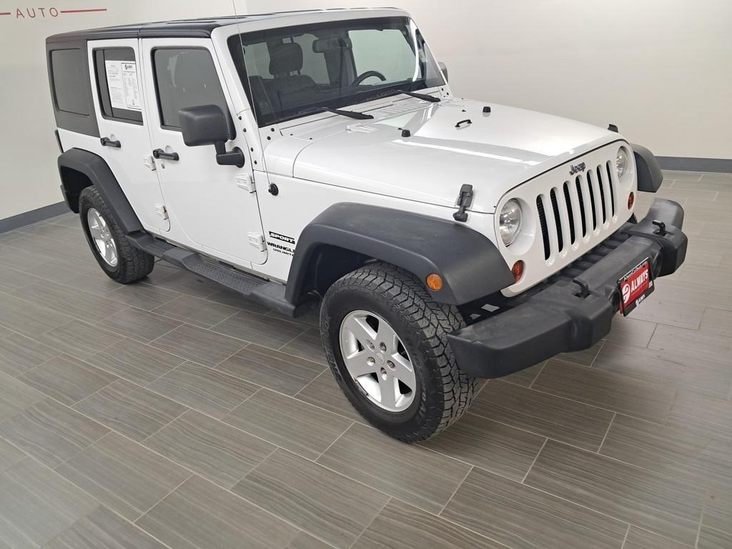 used 2013 Jeep Wrangler Unlimited car, priced at $13,499