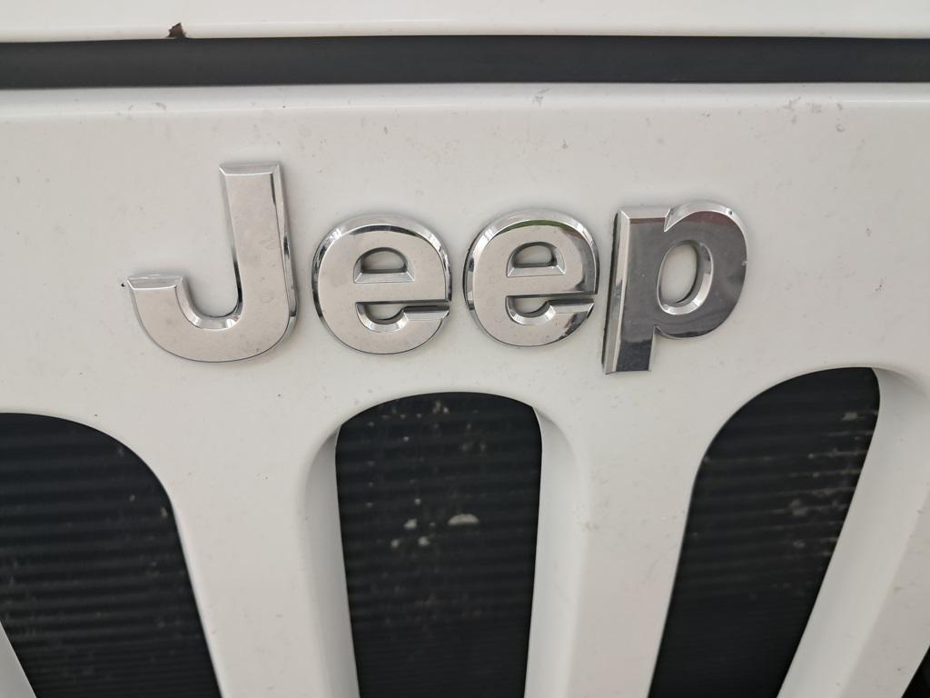 used 2013 Jeep Wrangler Unlimited car, priced at $13,499