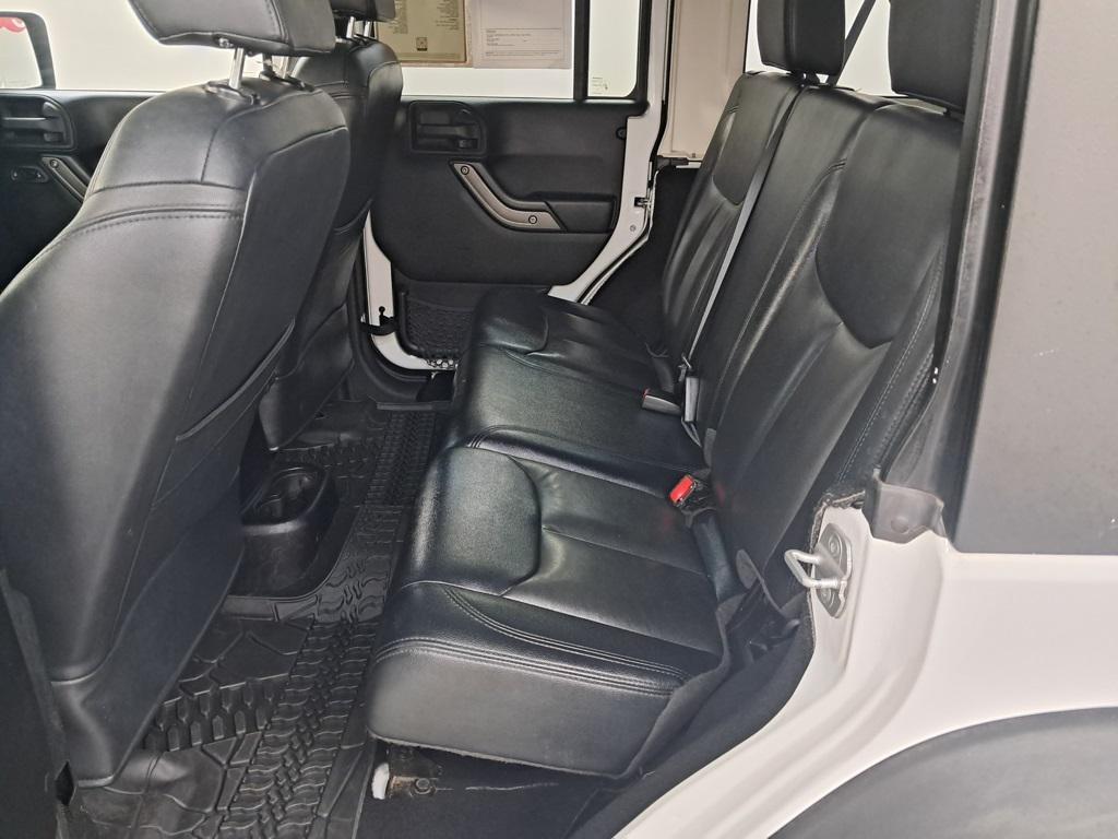 used 2013 Jeep Wrangler Unlimited car, priced at $13,499
