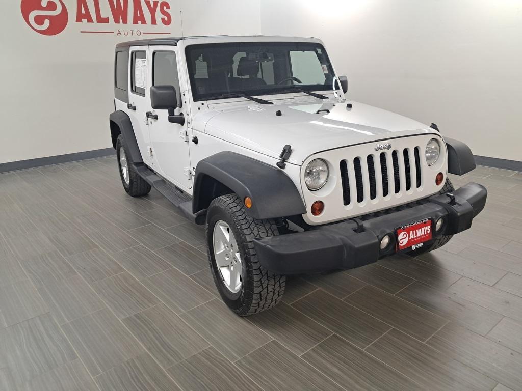 used 2013 Jeep Wrangler Unlimited car, priced at $13,499