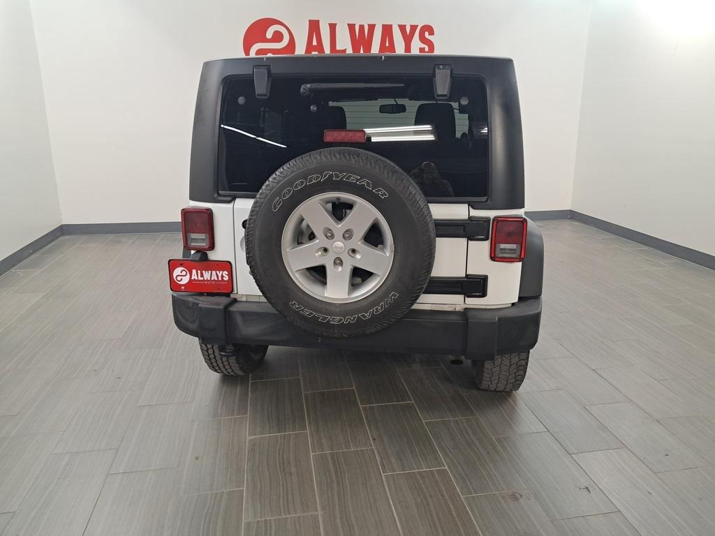 used 2013 Jeep Wrangler Unlimited car, priced at $13,499