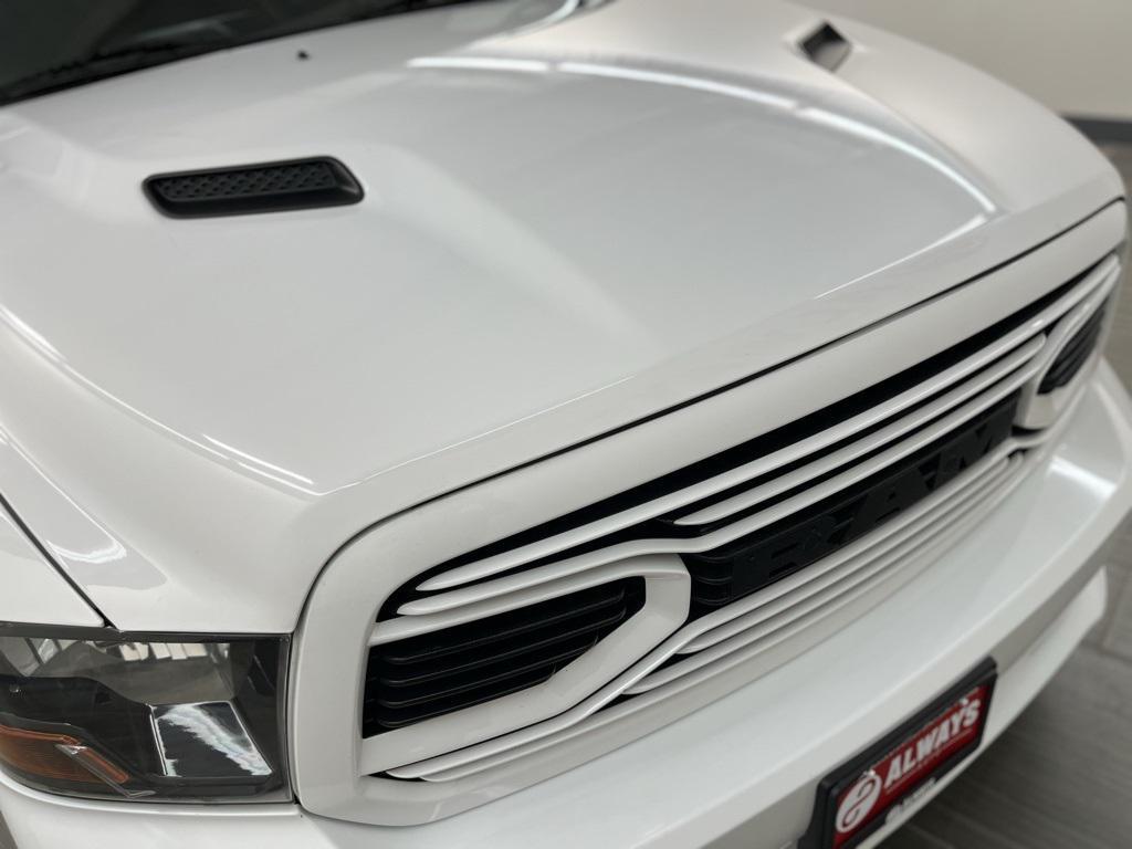 used 2018 Ram 1500 car, priced at $19,300