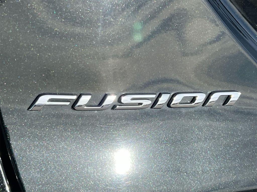 used 2014 Ford Fusion car, priced at $7,695