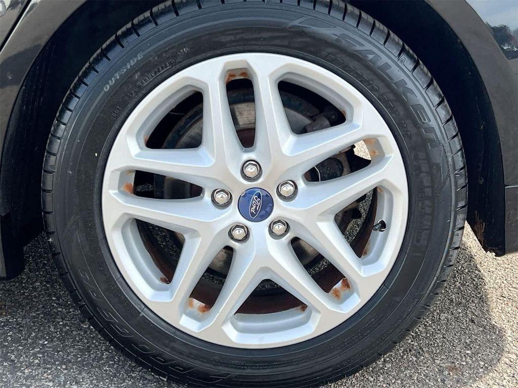 used 2014 Ford Fusion car, priced at $7,695