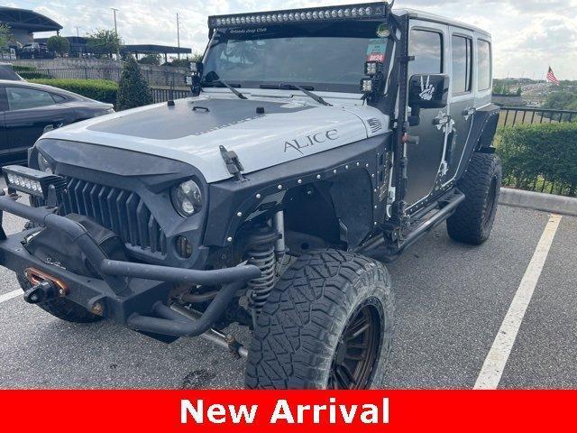 used 2014 Jeep Wrangler Unlimited car, priced at $21,000