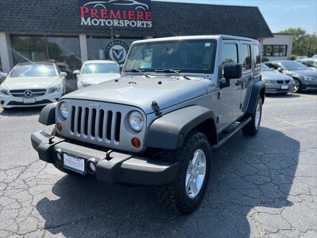 used 2015 Jeep Wrangler Unlimited car, priced at $18,890