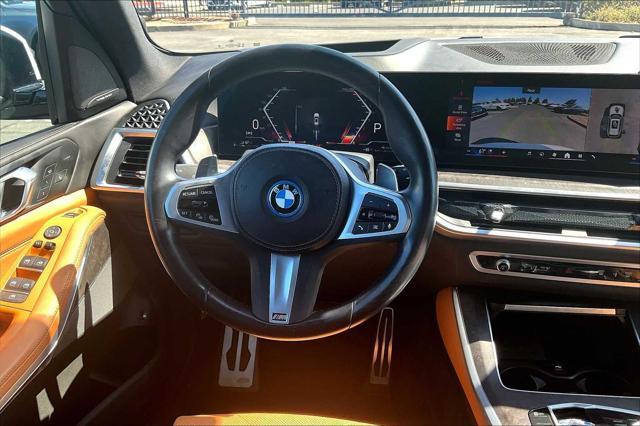 used 2024 BMW X5 PHEV car, priced at $73,470