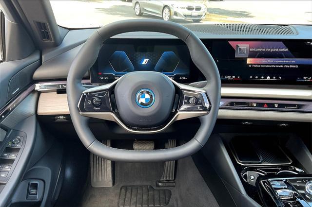 used 2024 BMW i5 car, priced at $59,995