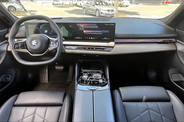 used 2024 BMW i5 car, priced at $59,995