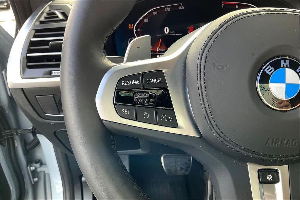 used 2025 BMW X4 car, priced at $56,696