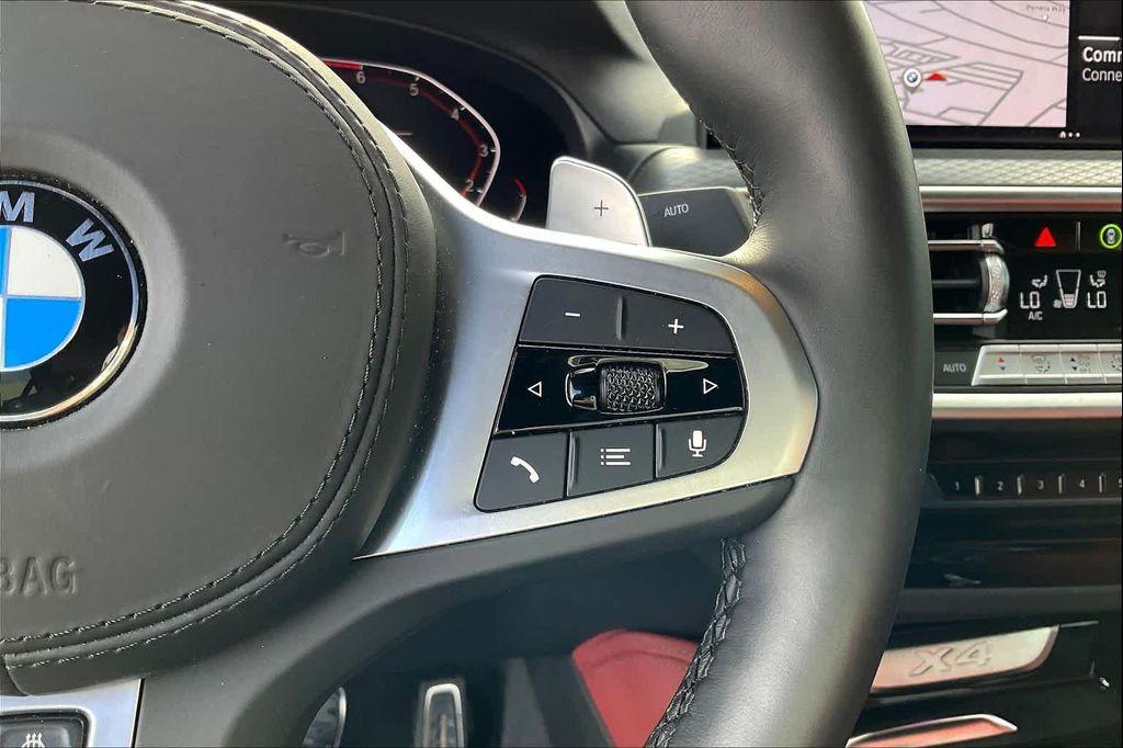 used 2025 BMW X4 car, priced at $56,696