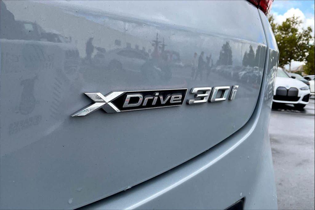 used 2025 BMW X4 car, priced at $56,696