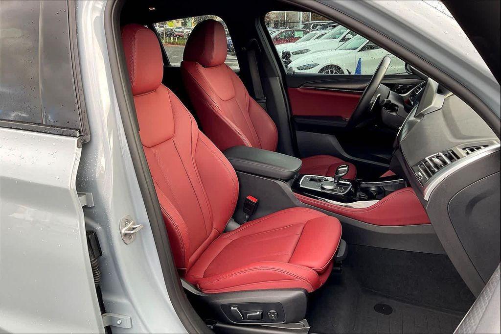 used 2025 BMW X4 car, priced at $56,696