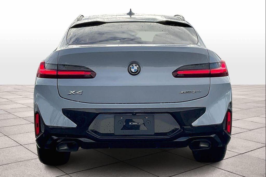 used 2025 BMW X4 car, priced at $56,696