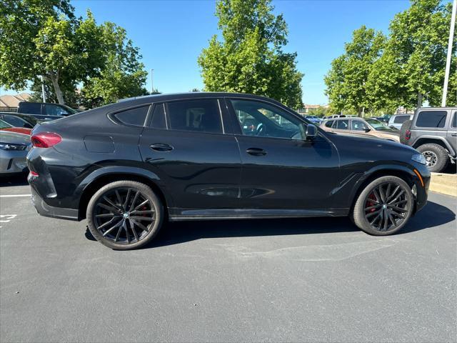 used 2024 BMW X6 car, priced at $75,995