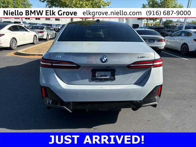 used 2025 BMW i5 car, priced at $70,997