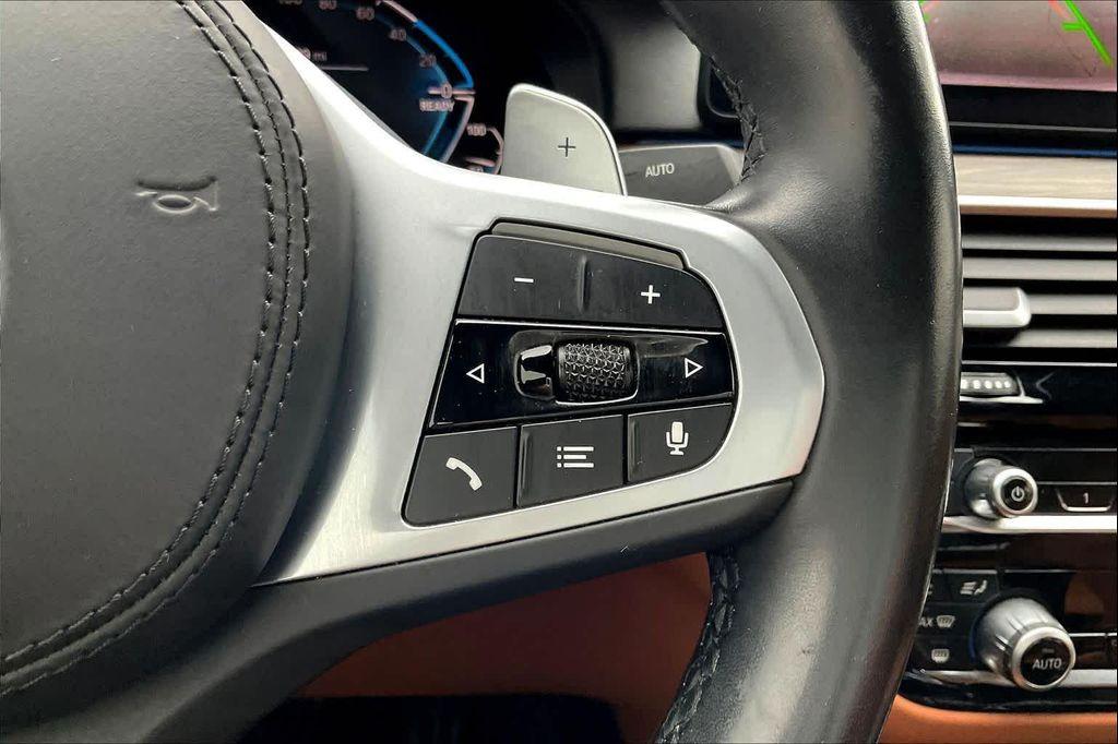 used 2023 BMW 530e car, priced at $35,395