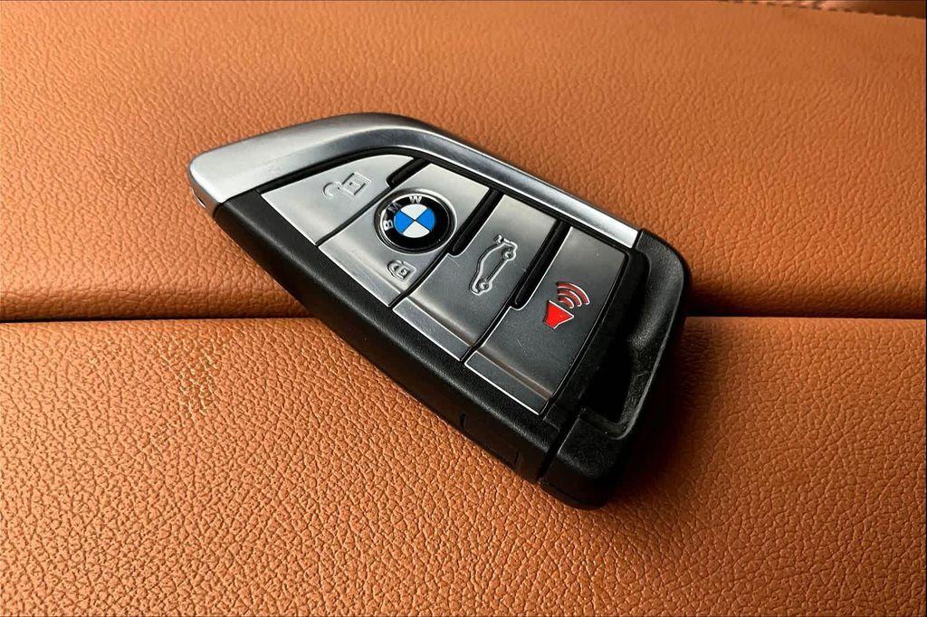 used 2023 BMW 530e car, priced at $35,395