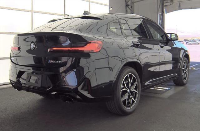 used 2024 BMW X4 car, priced at $63,993