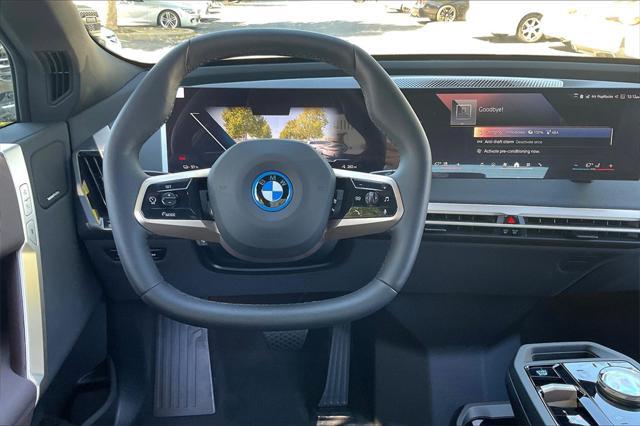 new 2025 BMW iX car, priced at $95,825